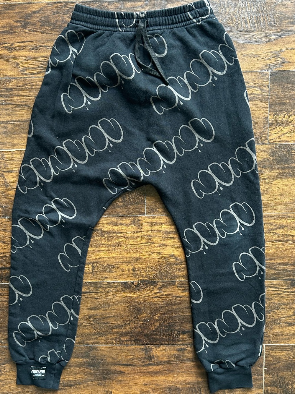 nununu Black Joggers with Light Gray Graphic